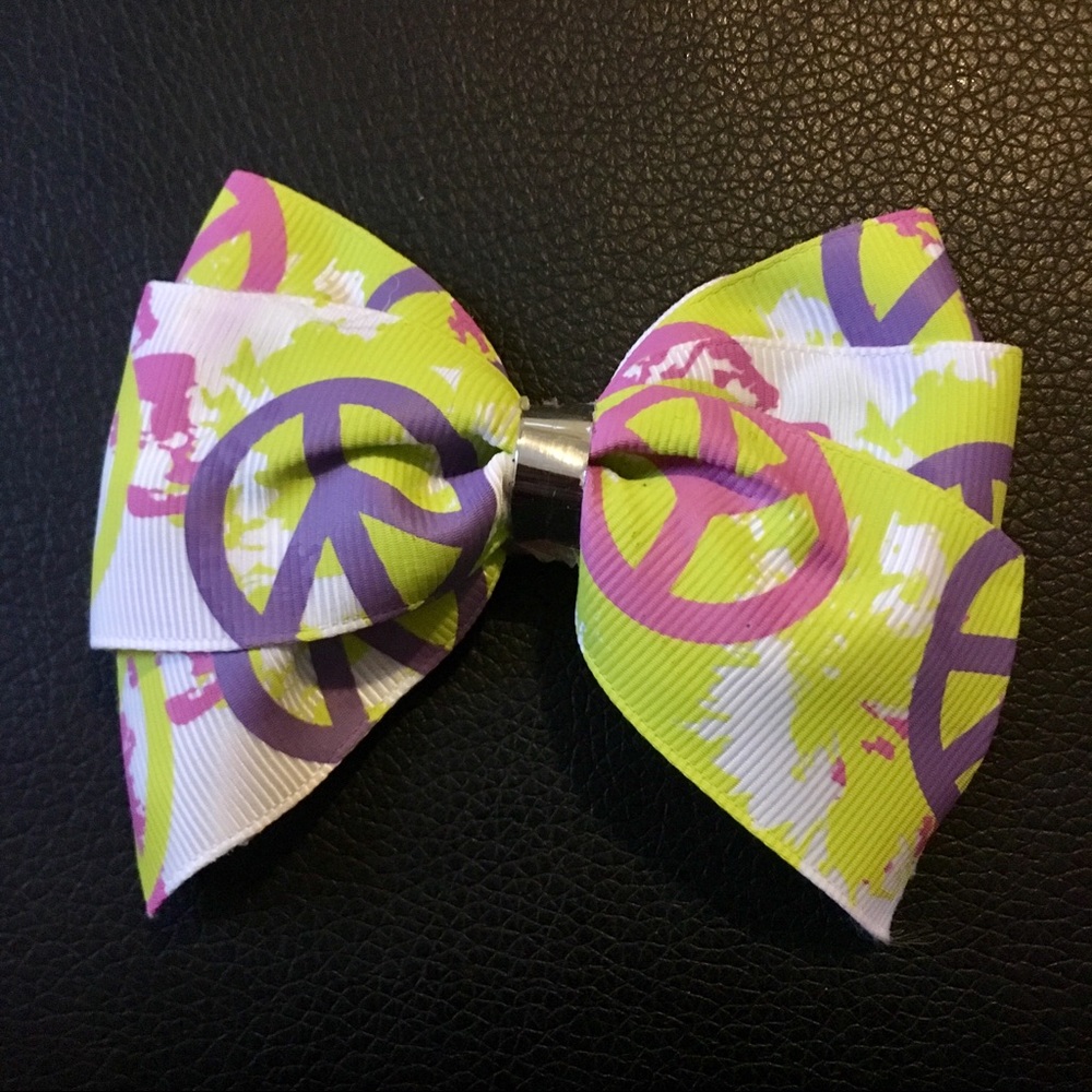 Handmade peace sign paint splatter hair bow